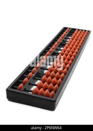 a vintage abacus tool set with 17 rods of brown beads and in a black frame used for making mathematical calculations isolated in a white background Stock Photo