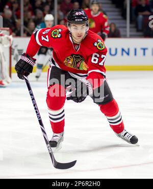 Jan. 24, 2012 - Chicago, Illinois, U.S - Chicago right wing Marian Hossa  (81) maneuvers with the puck during the NHL game between the Chicago  Blackhawks and the Nashville Predators at the