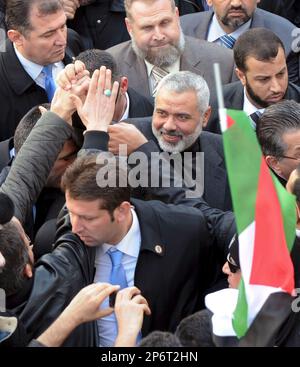 The Hamas premier of the Gaza Strip Ismail Haniyeh, center, makes a ...