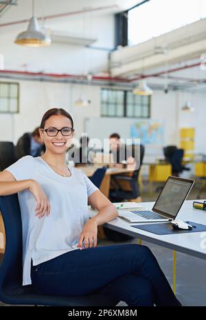 Developing tomorrows tech today. a designer at their workstation in an office. Stock Photo