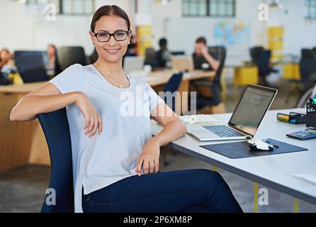 Developing tomorrows tech today. a designer at their workstation in an office. Stock Photo