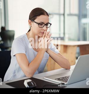 Developing tomorrows tech today. a designer sitting at her desk in an office. Stock Photo