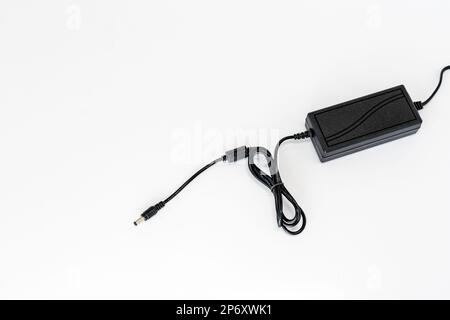 Laptop charger isolated on white background Stock Photo