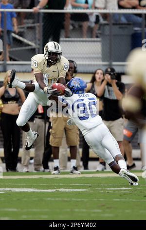 Central Florida's wide receiver Josh Reese (80) makes a catch against  Memphis cornerback Taurean Nixon (30) on Saturday, October 29, 2011 in  Orlando, FLA. (AP Photo/Brandon Goodman Stock Photo - Alamy