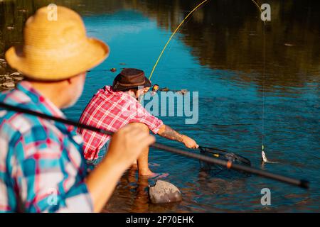 Weekends made for fishing. Male hobby. Life is always better when I am fishing. Retired bearded fisher. Keep calm and fish on. Strategy. Just do that Stock Photo