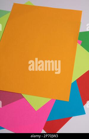 photo multi-colored sheets of paper on a white background Stock Photo