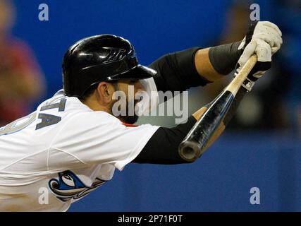 Toronto Blue Jays' Jose Bautista checks his swing during seventh-inning AL  baseball game action against the Los Angeles Angels in Toronto on Thursday,  Sept. 22, 2011. (AP Photo/The Canadian Press, Frank Gunn