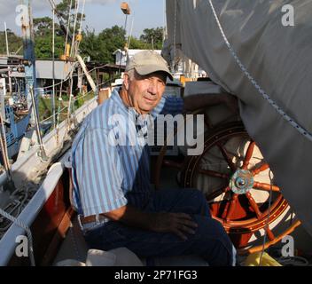 John Vardiman poses aboard his self built 40 foot long schooner at