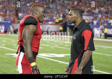 September 3, 2011: Georgia's Orson Charles goes head to head with legendary  Georgia running back Herschel Walker prior to the Chick-Fil-A Kickoff Game  between the Georgia Bulldogs and the Boise State Broncos