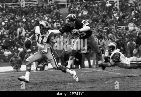 https://l450v.alamy.com/450v/2p741y1/file-this-dec-17-1977-file-photo-shows-washington-redskins-chris-hanburger-55-chasing-los-angeles-rams-quarterback-pat-haden-11-as-rams-center-rich-saul-grabs-his-foot-during-a-football-game-in-washington-hanburger-will-be-inducted-into-the-pro-football-hall-of-fame-on-saturday-aug-6-2011-ap-photofile-2p741y1.jpg