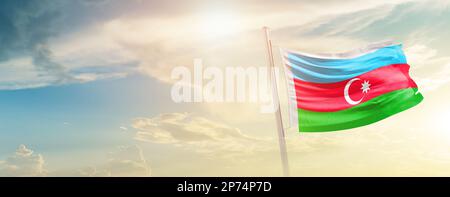 Aerbaijan waving flag in beautiful sky.flagpole Stock Photo