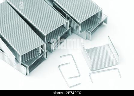 Heap staples wires on white background. Stock Photo