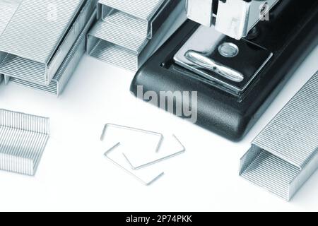 Stapler with staples wires on white background. Stock Photo