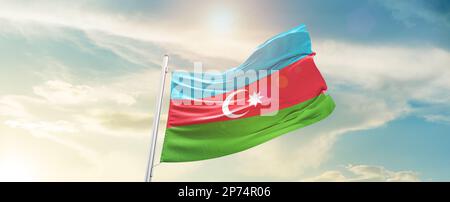 Aerbaijan waving flag in beautiful sky.flagpole Stock Photo