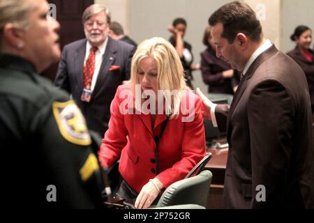 Former New England Patriots player Aaron Hernandez, left, at listens as his  attorney Jose Baez cross-examines witness Alexander Bradley during Hernandez'  trial at Suffolk Superior Court on Wednesday, March 22, 2017, in