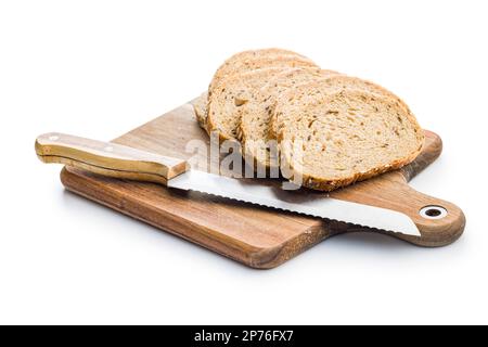 Sliced whole grain bread. Tasty wholegrain pastry with seeds isolated on the white background. Stock Photo