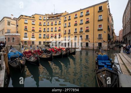 Gondolas tied up near the Hotel Cavalletto, San Marco district, Venice, Italy Stock Photo