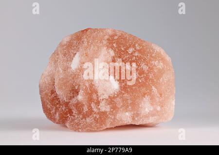 Halite,  commonly known as rock salt, is a type of salt, the mineral (natural) form of sodium chloride (NaCl). Stock Photo