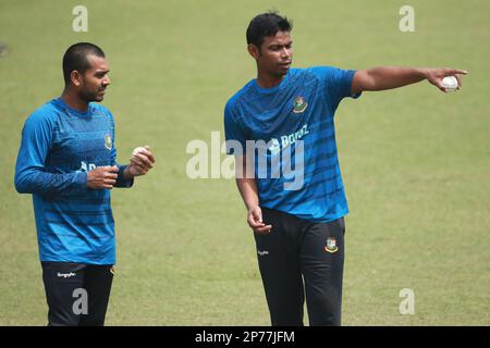 Mehidy Hasan Miraz and Tanvir Ahmed during Bangladesh T20 Cricket Team practice ahead of the first match of the series at Zahur Ahmed Chowdhury Cricke Stock Photo