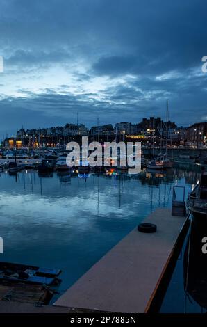 Boats moored at Ramsgate Harbour in Kent South East England at night Stock Photo