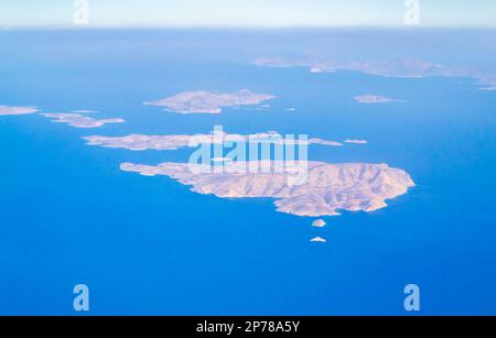 Iraklia , Schinoussa,Keros,Amorgos islands seen from flying airplane to Santorini.Greek islands in the Cyclades group in the Aegean Sea. . Stock Photo