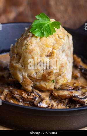 Bavarian Bread Dumpling In Mushroom Sauce Stock Photo