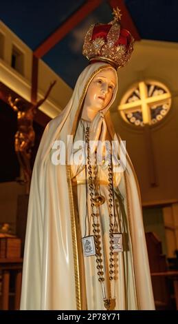 The world-famous International Pilgrim Virgin Statue of Our Lady of Fatima sculped in 1947 by Jose Thedim; St. Ambrose Catholic Church in Woodbury, MN. Stock Photo