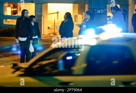 https://l450v.alamy.com/450v/2p79064/in-this-friday-feb-25-2011-photo-confused-by-the-presence-of-dozens-of-police-vehicles-with-lights-flashing-bystanders-watch-as-charlotte-mecklenburg-police-officers-form-an-escort-on-scott-avenue-to-escort-the-body-of-officer-fred-thornton-as-he-was-taken-from-carolinas-medical-center-in-charlotte-nc-police-in-north-carolina-say-fred-thornton-a-swat-officer-was-securing-a-stun-grenade-known-as-a-flash-bang-at-his-home-when-it-exploded-killing-him-charlotte-police-chief-rodney-monroe-says-50-year-old-thornton-suffered-massive-internal-injuries-when-the-grenade-detonated-friday-p-2p79064.jpg