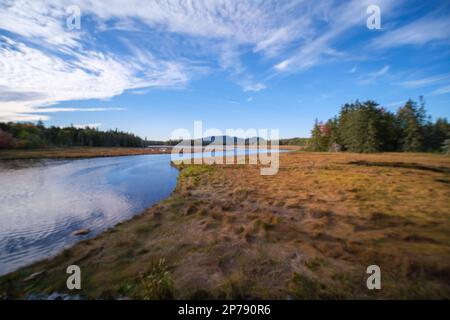 Wide angle shot of a lake in Acadia National Park with deep colours Stock Photo