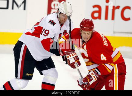Jason Spezza Face-off with Chris Kelly Editorial Stock Photo