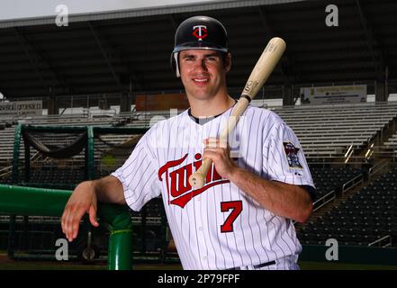 The Minnesota Twins' Joe Mauer poses for photographs with his twin girls,  Emily and Maren, prior to the start of play against the Chicago White Sox  at Target Field in Minneapolis on Saturday, June 21, 2014. The Twins won,  4-3. (Photo by Jim Gehrz