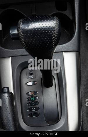 Generic car automatic gearbox transmission selector lever close up shot. Stock Photo