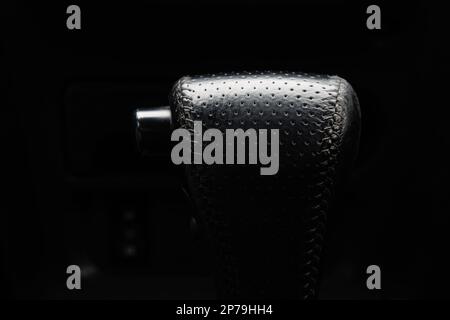 Generic car automatic gearbox transmission selector lever close up shot. Stock Photo