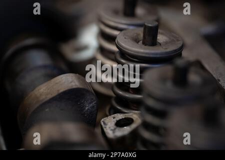 Cylinder head of an auto engine. Car service. Engine maintenance. Valve spring detail. Stock Photo