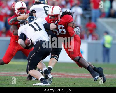 Nov. 13, 2010 - Raleigh, Carter-Finley Stadium, United States of America - NC  State quarterback Russell Wilson (#16) talks with linebacker Nate Irving  (#56) late in the game. NC State wins big