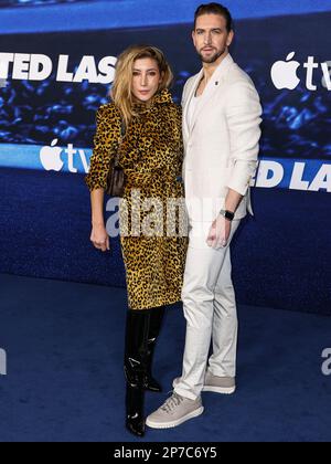 WESTWOOD, LOS ANGELES, CALIFORNIA, USA - MARCH 07: Dichen Lachman and Maximilian Osinski arrive at the Los Angeles Premiere Of Apple TV+'s Original Series 'Ted Lasso' Season 3 held at the Regency Village Theatre on March 7, 2023 in Westwood, Los Angeles, California, United States. (Photo by Xavier Collin/Image Press Agency) Stock Photo