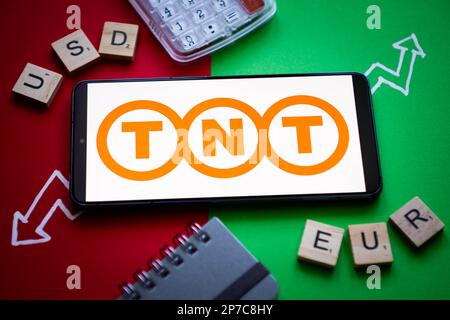 Nysa, Poland. 8th Mar, 2023. In this photo illustration a TNT logo seen displayed on a smartphone. (Credit Image: © Mateusz Slodkowski/ZUMA Press Wire) EDITORIAL USAGE ONLY! Not for Commercial USAGE! Stock Photo