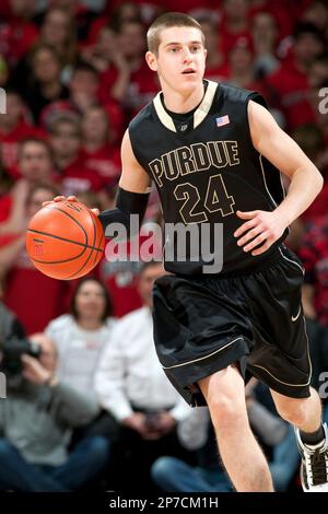 Purdue guard Ryne Smith (24) congratulates teammate Lewis Jackson, right,  during the second half against St. Peter's in the second round of the 2011  NCAA Men's Basketball Championship at the United Center