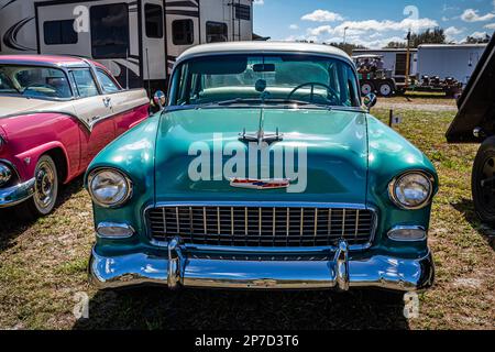 Fort Meade, FL - February 24, 2022: High perspective front view of a 1955 Chevrolet Bel Air 4 Door Sedan at a local car show. Stock Photo