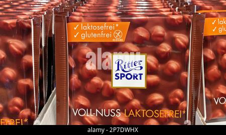 Viersen, Germany - March 3. 2023: Closeup of packages gluten and lactose free Ritter Sport nut chocolate in shelf of german store Stock Photo