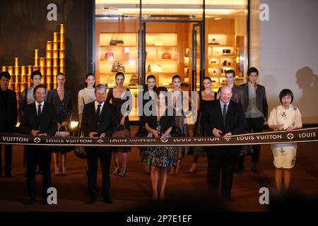 Dancers perform at the new Louis Vuitton flagship store in Chengdu in  southwest China's Sichuan province on Thursday, Sept. 2, 2010. Louis Vuitton  opened its 9th flagship store in China mainland.(Photo By
