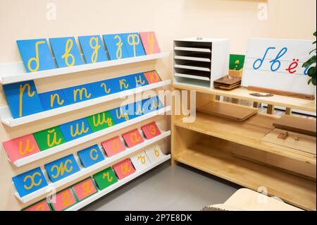 Classroom of Montessori kindergarten. The colorful Montessori material. Concept of children learning toy Stock Photo