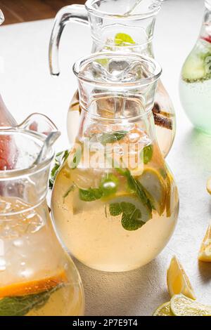 Jars of assorted variety of fresh fruit lemonades Stock Photo