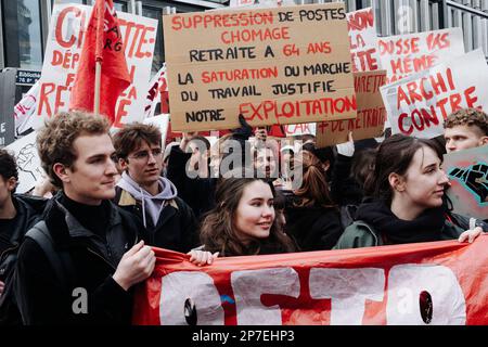 France / Paris / 07/03/2023, Jan Schmidt-Whitley/Le Pictorium -  Demonstration against pension reform in Paris  -  7/3/2023  -  France / Paris / Paris  -  Architecture students protesting against the pension reform with placards. Even if the number of strikers did not reach January's records, the unions hailed a 'historic mobilisation' on Tuesday 7 March, during demonstrations that brought together 1.28 million people in France, according to the Ministry of the Interior, and 3.5 million, according to the CGT. Stock Photo
