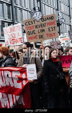 France / Paris / 07/03/2023, Jan Schmidt-Whitley/Le Pictorium -  Demonstration against pension reform in Paris  -  7/3/2023  -  France / Paris / Paris  -  Architecture students protesting against the pension reform with placards. Even if the number of strikers did not reach January's records, the unions hailed a 'historic mobilisation' on Tuesday 7 March, during demonstrations that brought together 1.28 million people in France, according to the Ministry of the Interior, and 3.5 million, according to the CGT. Stock Photo