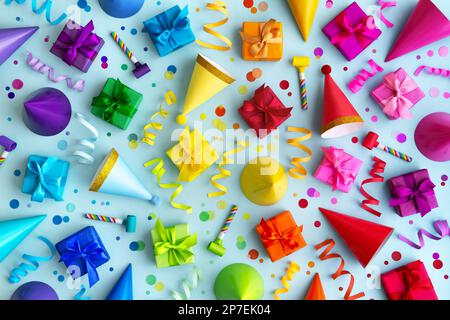 Overhead background collection of colorful birthday party objects in rainbow colors Stock Photo
