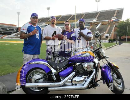 Minnesota Vikings mascot Ragnar rides onto the field in front of soldiers  in honor of Salute to Service on Veterans Day before an NFL football game  between the Vikings and the Detroit