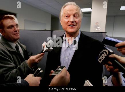 Chicago Bears chairman Michael McCaskey, left, and owner Virginia McCaskey  , center, react as they are presented with the George Halas Trophy after  the Bears beat the New Orleans Saints, 39-14, to