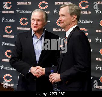 Chicago Bears chairman Michael McCaskey, left, and owner Virginia McCaskey  , center, react as they are presented with the George Halas Trophy after  the Bears beat the New Orleans Saints, 39-14, to