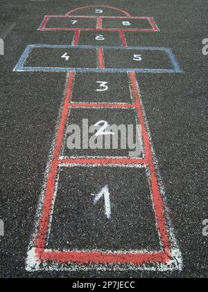 several numbers painted on asphalt Stock Photo